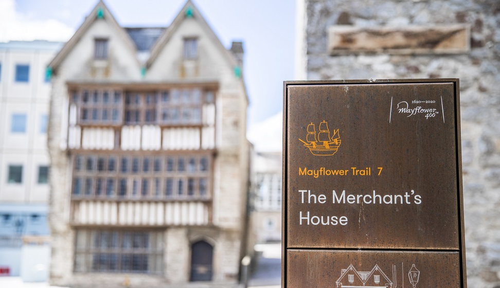 The Merchant House trail sign in front of the Merchant House